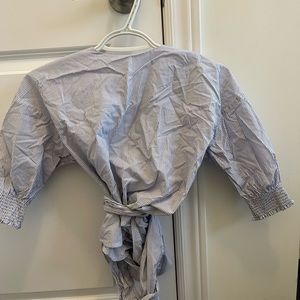 Babaton size small wrap around blouse